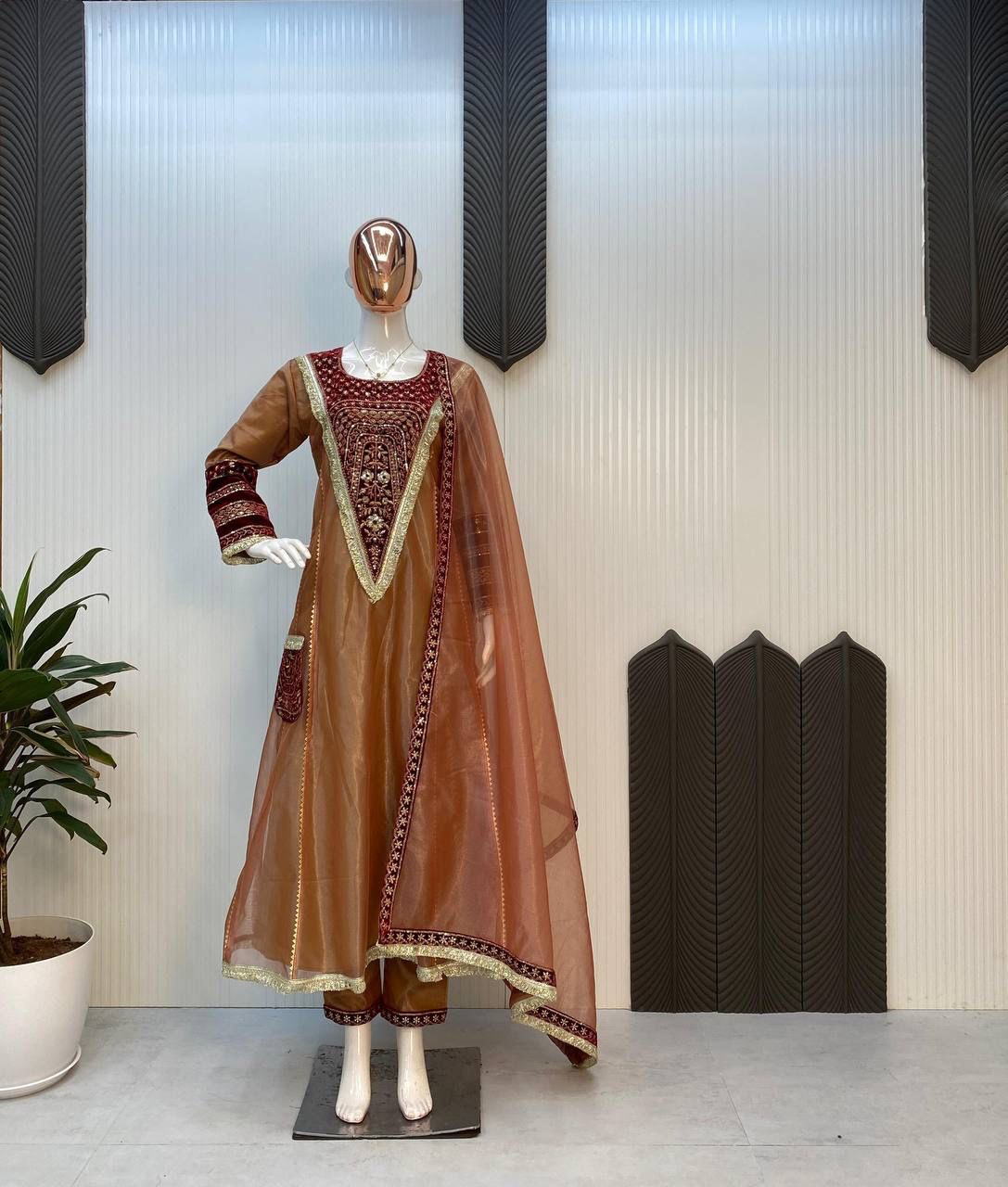 Demanding Embroidery Sequence Work Brown Color Gown