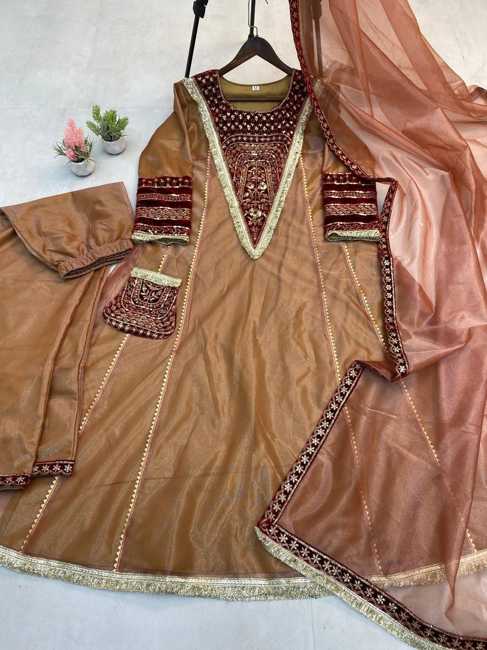 Demanding Embroidery Sequence Work Brown Color Gown
