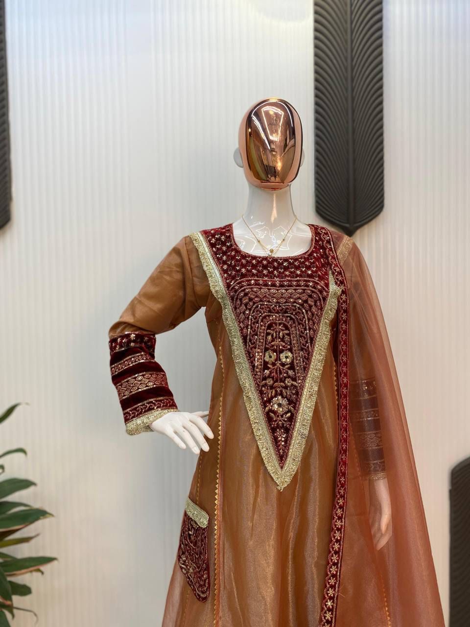 Demanding Embroidery Sequence Work Brown Color Gown